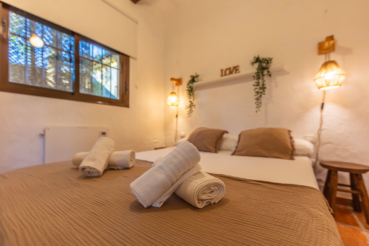 mm villa paraiso detalle cama toallas