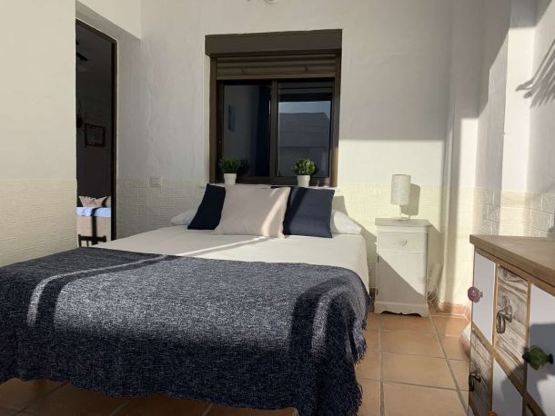 dormitorio cama matrimonio tonos calentitos las canas b3